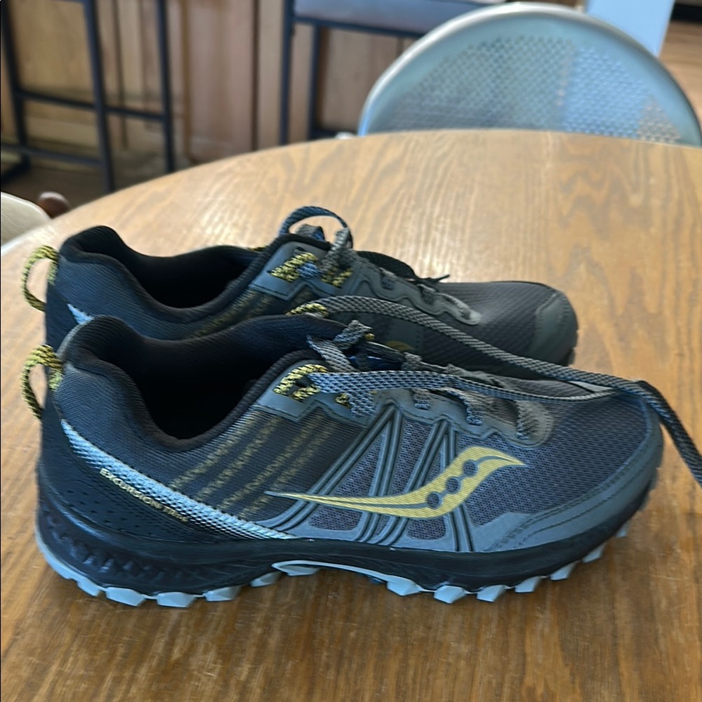 Saucony Black Athletic Shoes with Rugged Outsole and Breathable Mesh